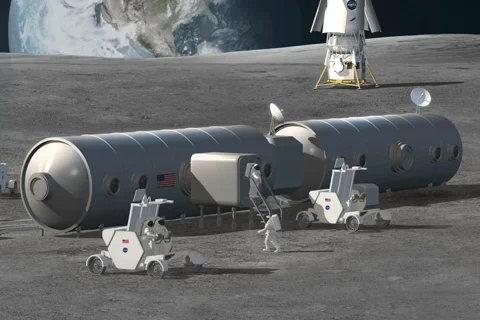 A concept rendering of a modular lunar base, with astronauts and rovers conducting operations on the surface.