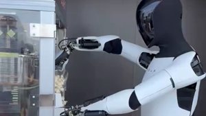 Robot Tesla Optimus obsluhuje v bistru a servíruje dobroty